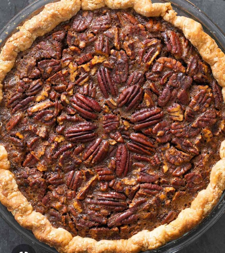 Homemade pecan pie with a hand-crimped crust